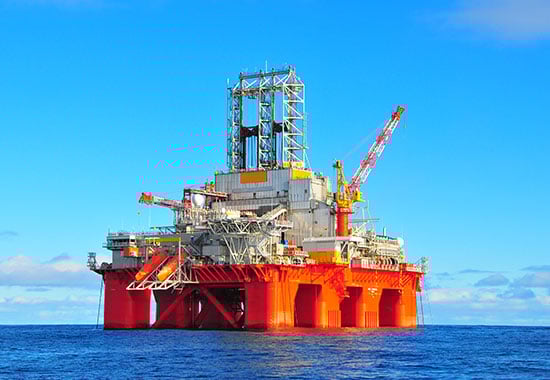 An oil rig in the middle of the ocean