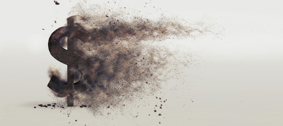 Dollar sign dissolving