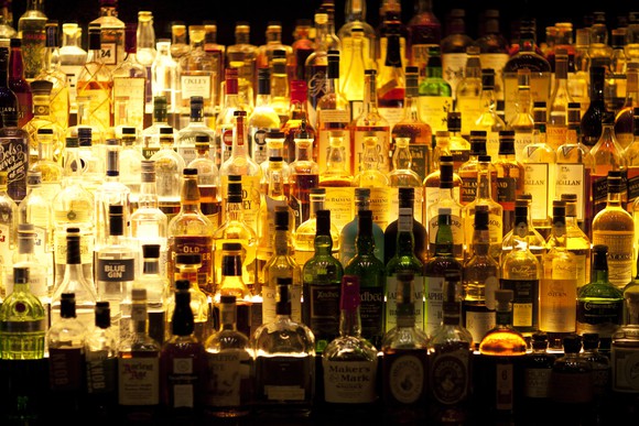 Bar filled with liquor bottles. 