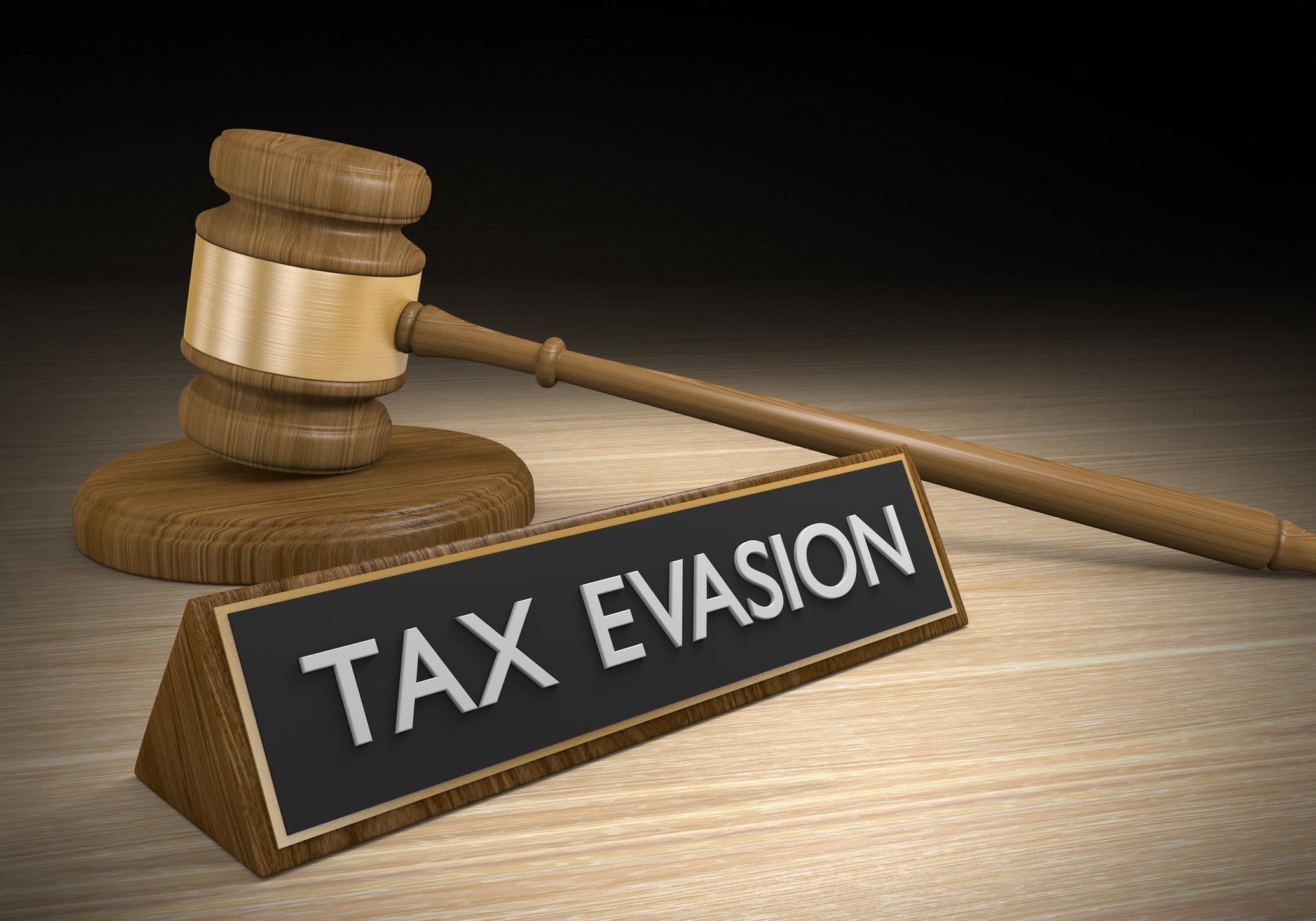 Tax evasion sign with gavel
