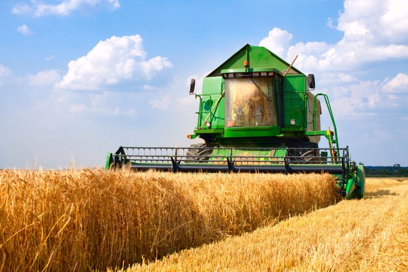 A combine harvesting crops.