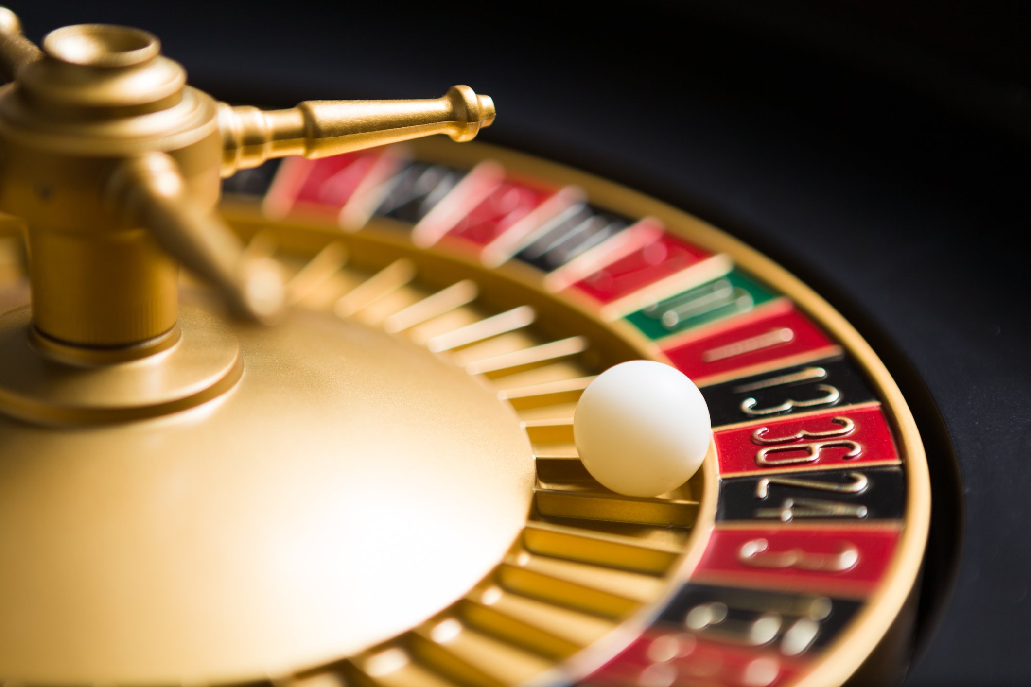 A ball spins on a roulette gaming wheel.