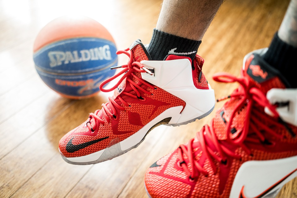 A pair of red-and-white Nike sneakers.