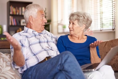 senior couple on couch_GettyImages-486391116
