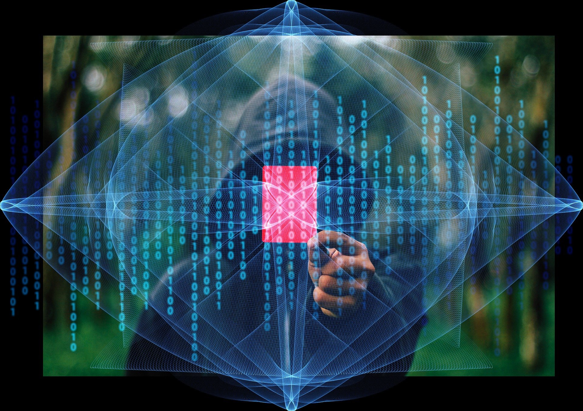 Hacker in hoodie with stylized binary code.