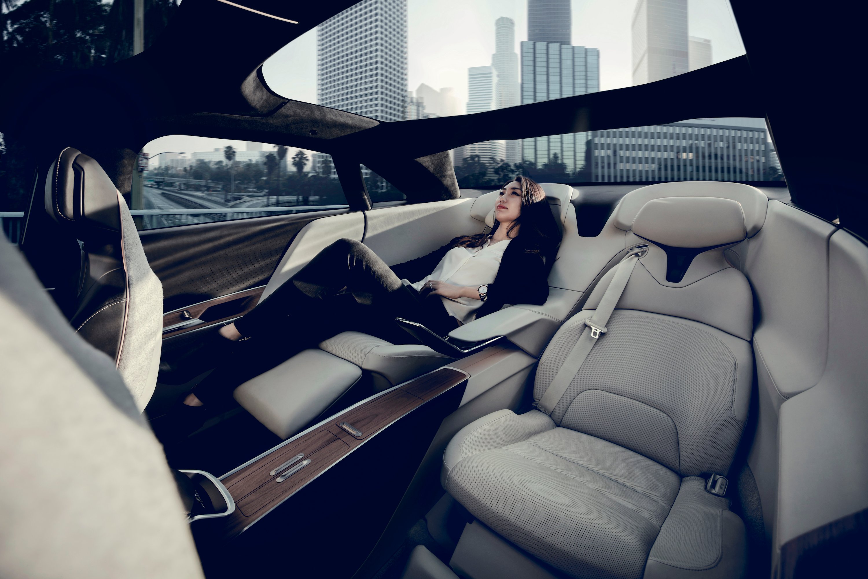 Woman reclining in Lucid Air executive seating