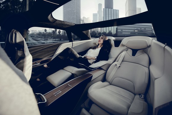 Woman reclining in Lucid Air executive seating