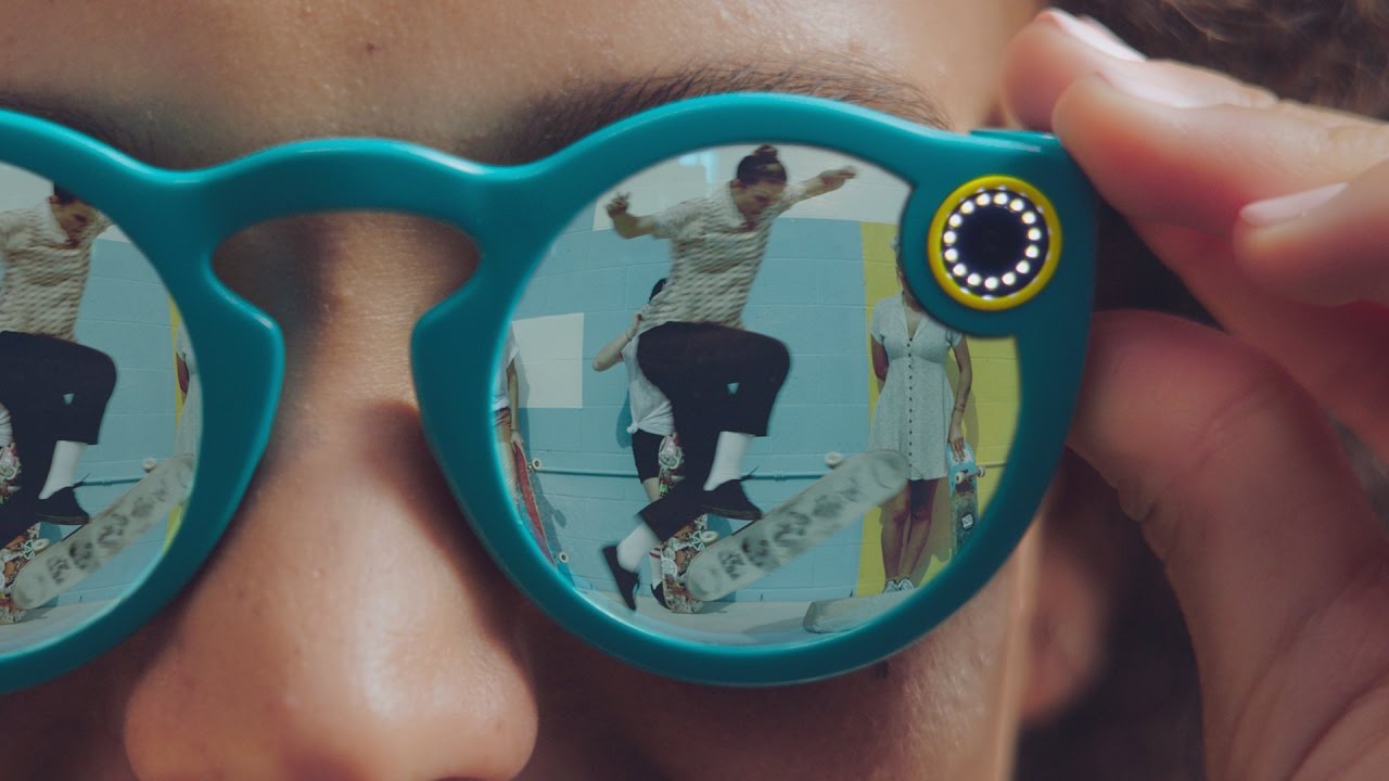Someone wearing Snap's Spectacles watching a skateboarder perform tricks.