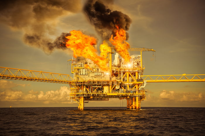 Offshore drilling rig on fire. 