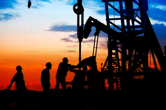 Oil workers on a rig. 