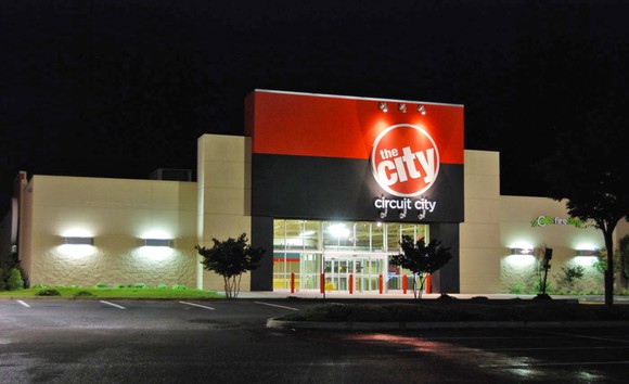 Picture of a Circuit City store at night.