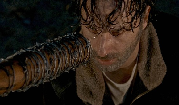Rick Grimes, as played by Andrew Lincoln, staring down Lucille at the end of The Walking Dead's season 6.