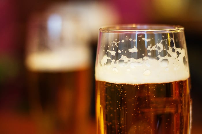 Beer in a pint glass.