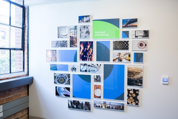 Photo collage forming Okta's circular logo