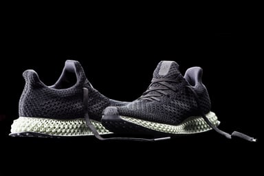 carbon adidas pair of 3d printed shoes