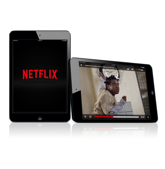 Netflix content displayed on two tablets.