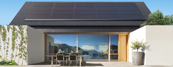 A house showcasing Tesla's solar panel design.