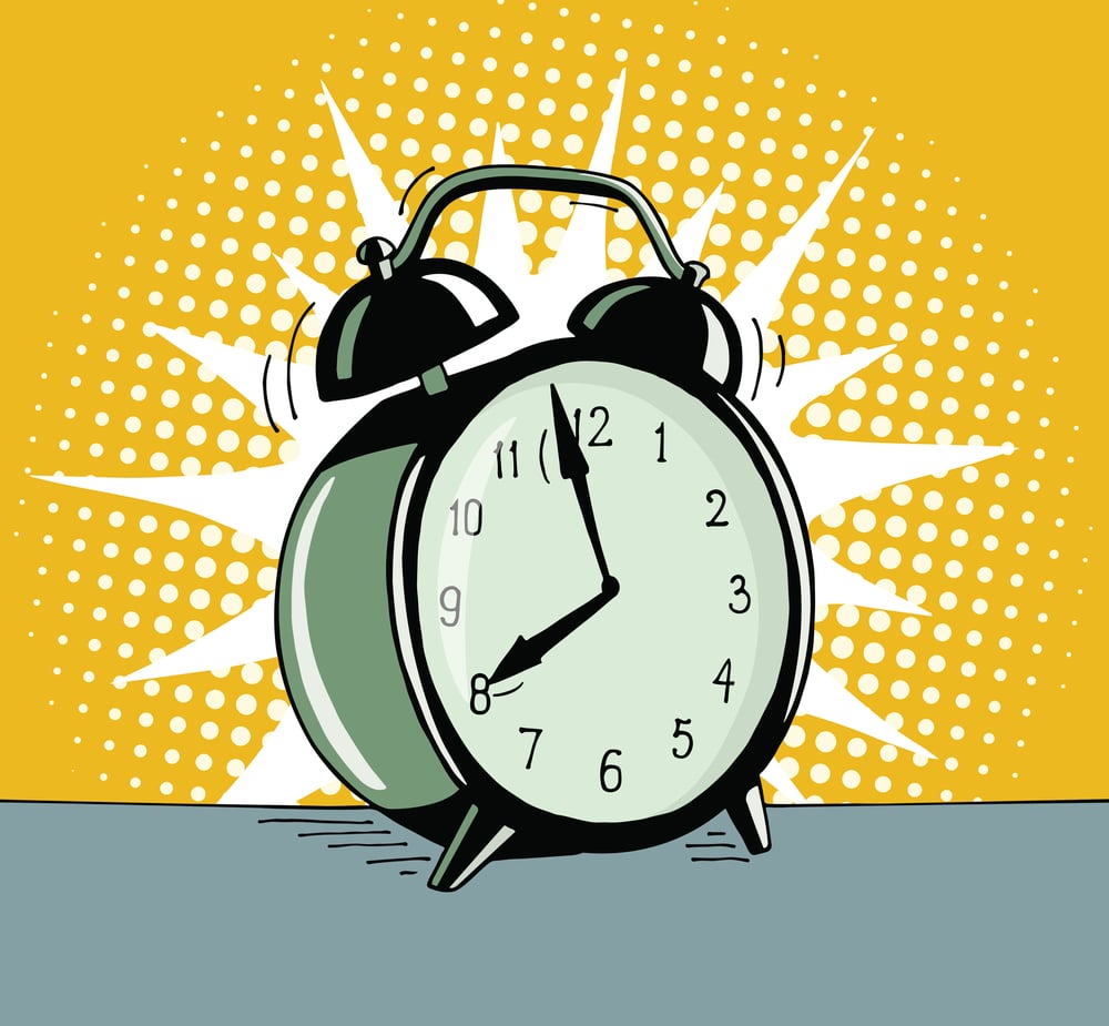Pop-art cartoon of ringing alarm clock