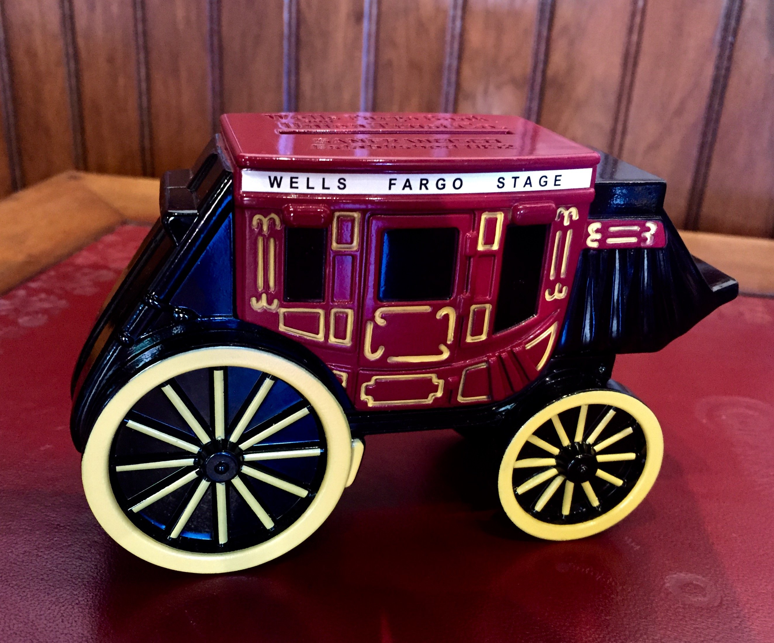 Toy stagecoach with Wells Fargo name.