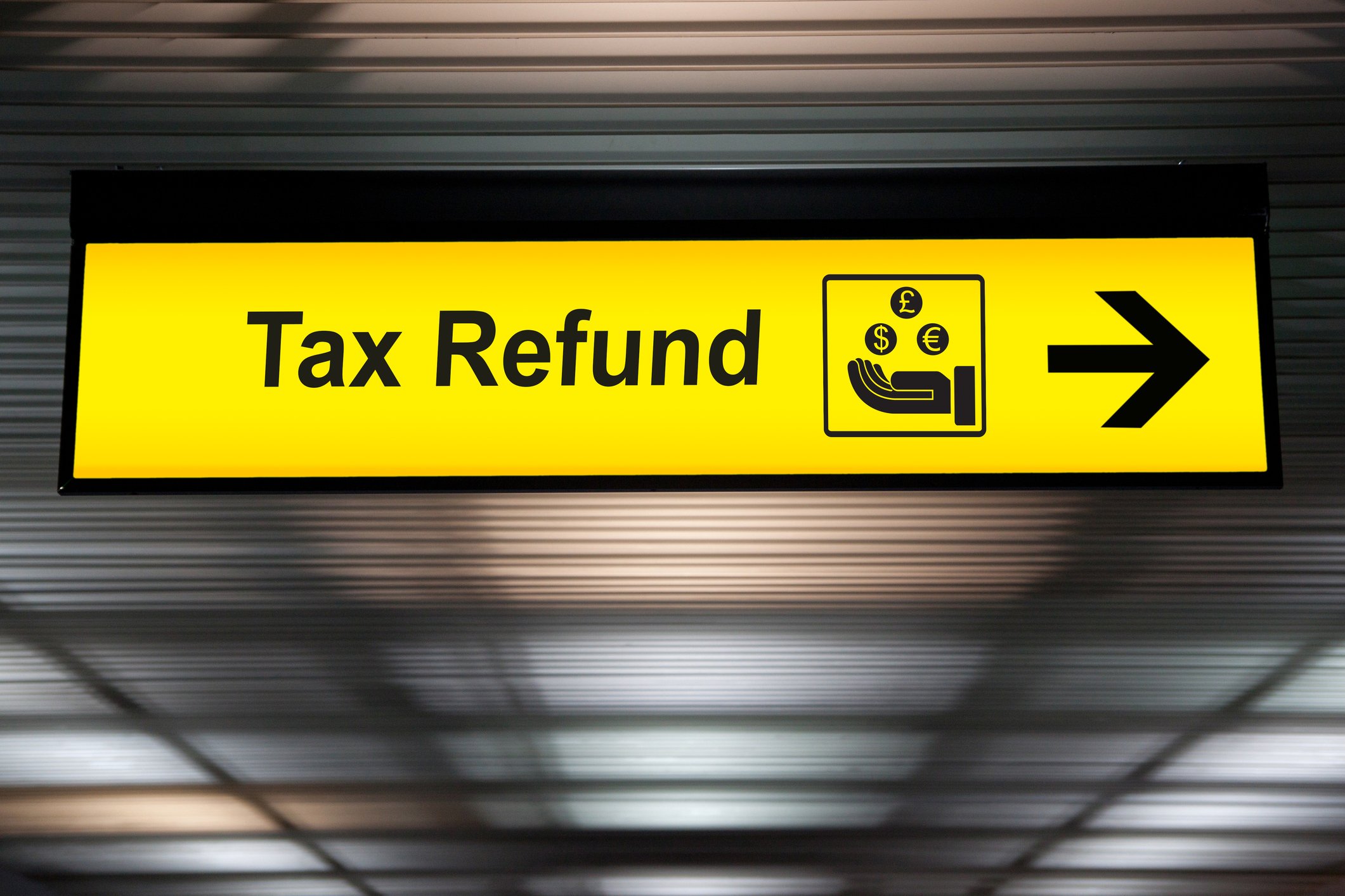 Tax refund sign at airport