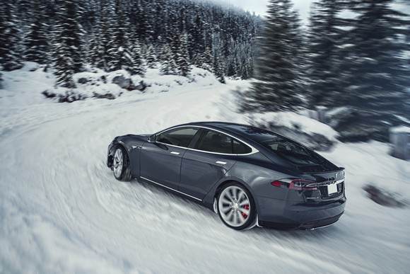Tesla Model S driving in snow
