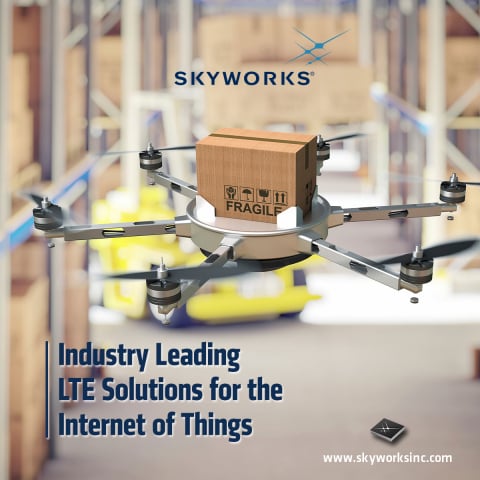 A drone carrying a box.