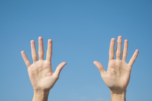 Two hands with all ten fingers spread