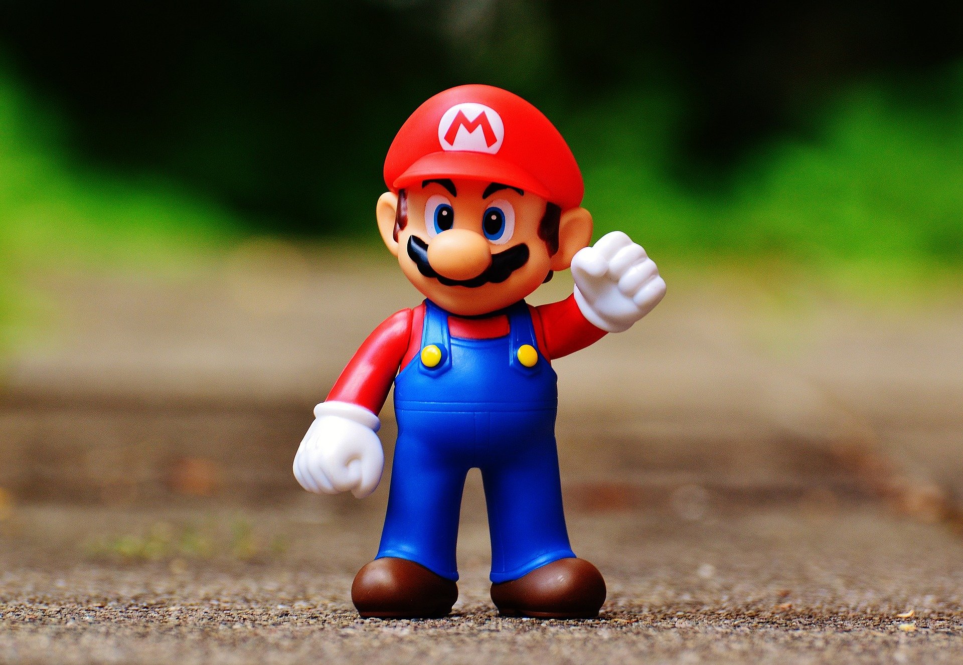 Toy figure of Nintendo's Mario character.