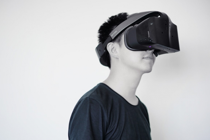 A man wearing an Intel VR headset.