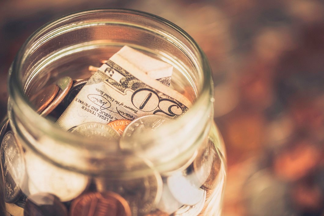 A $50 bill in a change jar.