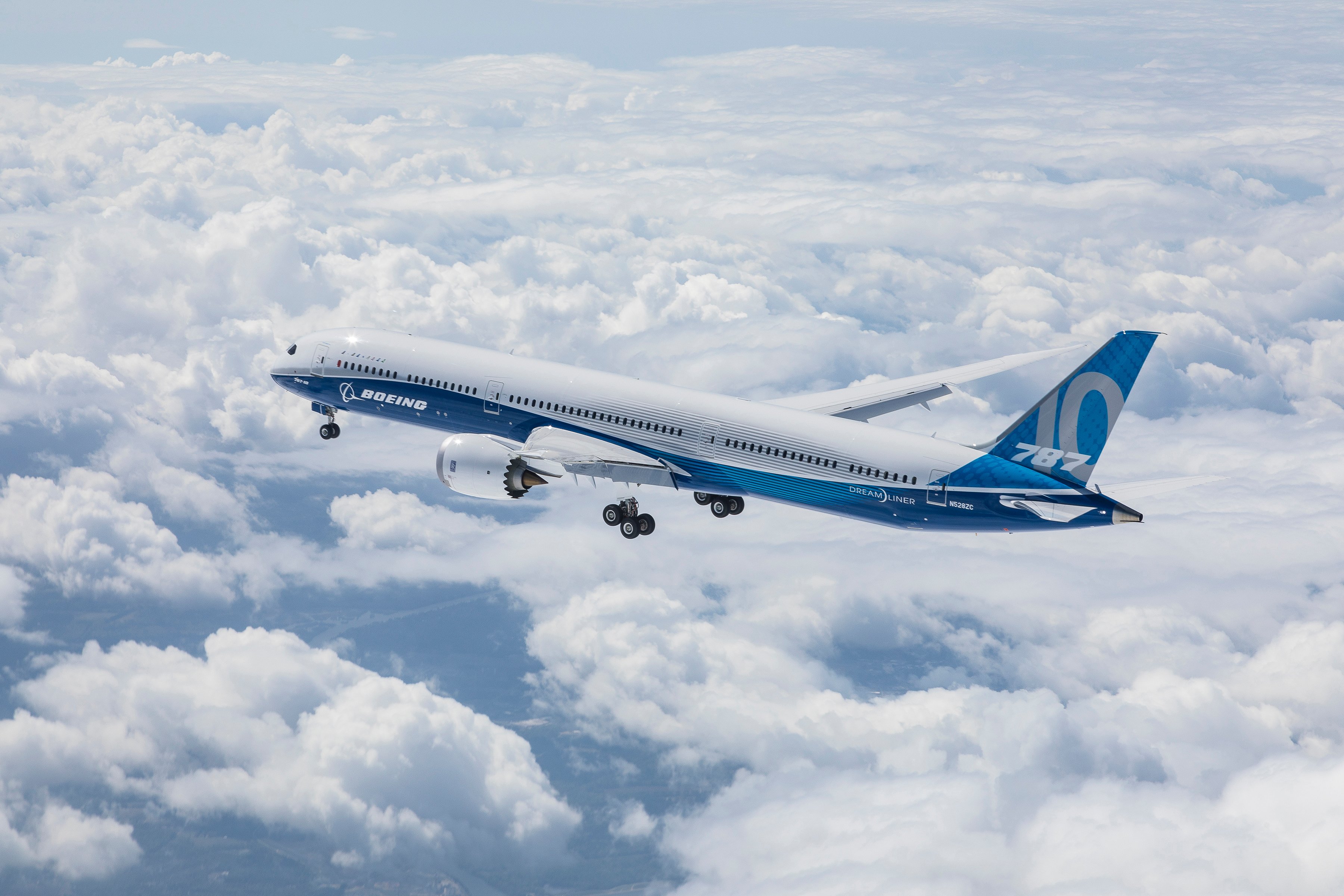 A Boeing 787 Dreamliner above clouds