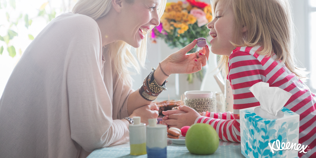 A family using Kleenex tissues around the house.