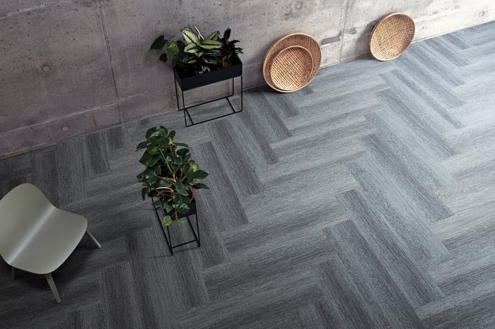 Herringbone carpet tile concept on display.