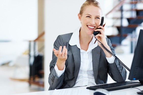 Representative on phone working with mortgage customer.