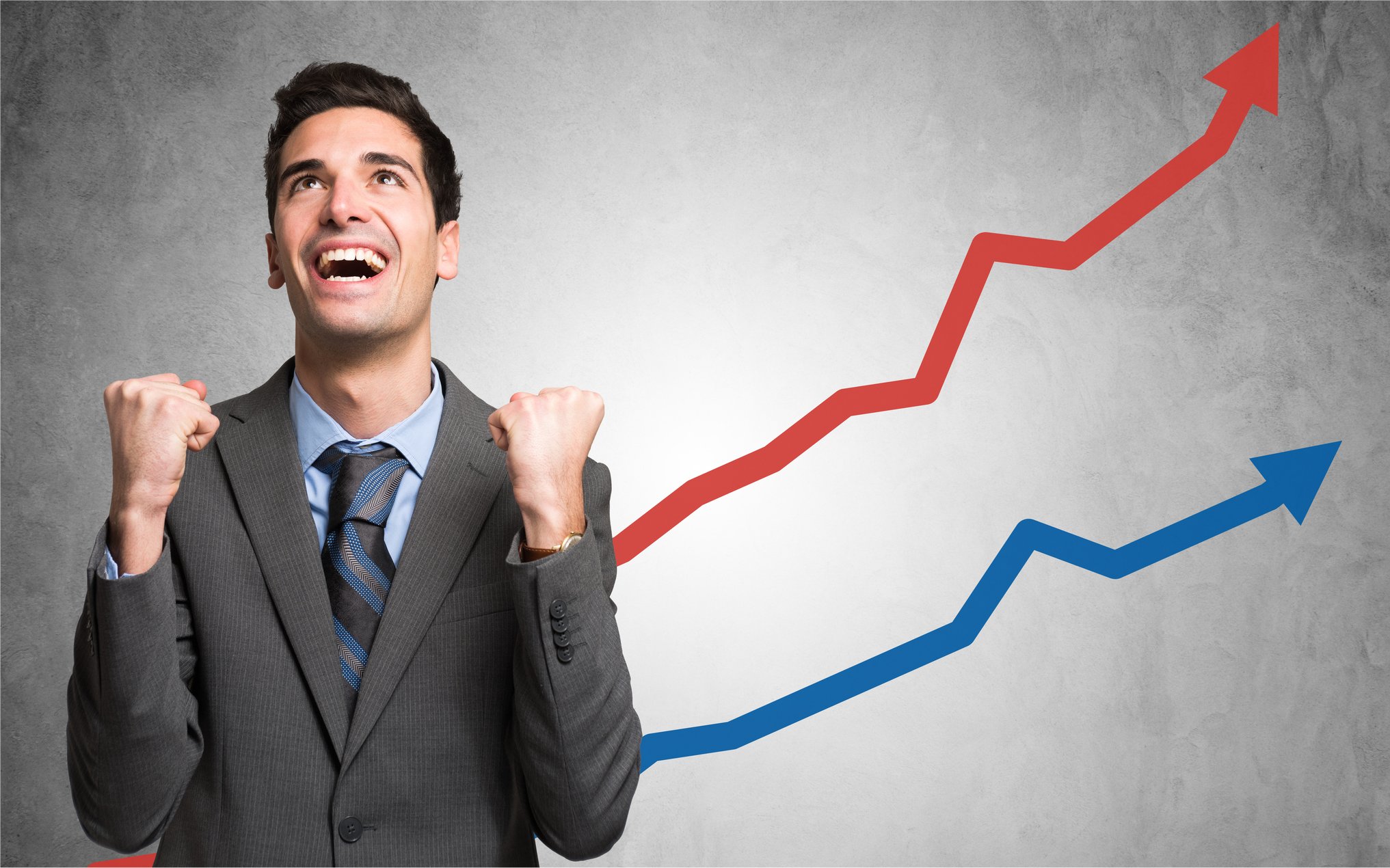 An investor watches a chart with growing returns.