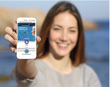 Woman holding a smartphone.