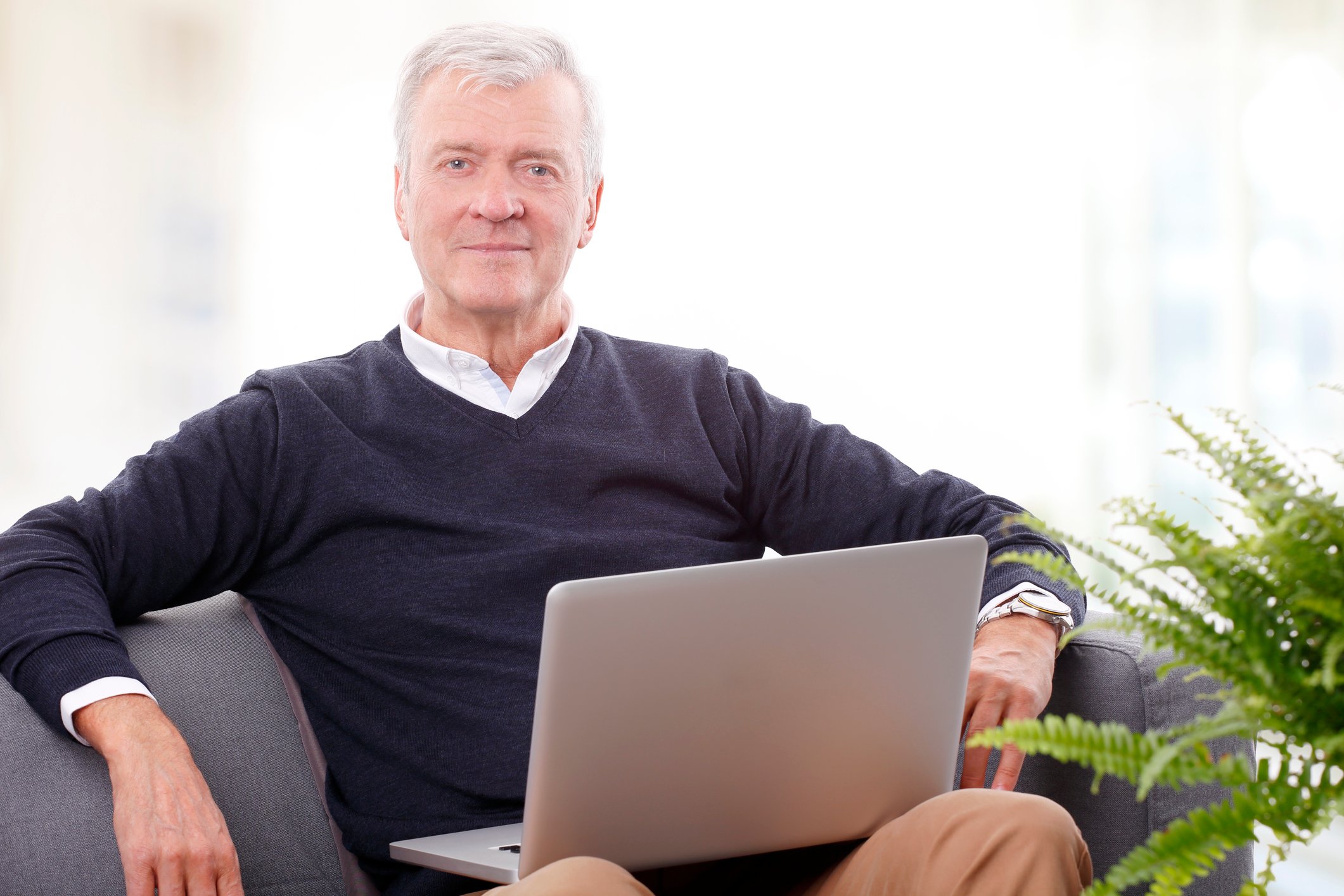 Senior male with laptop
