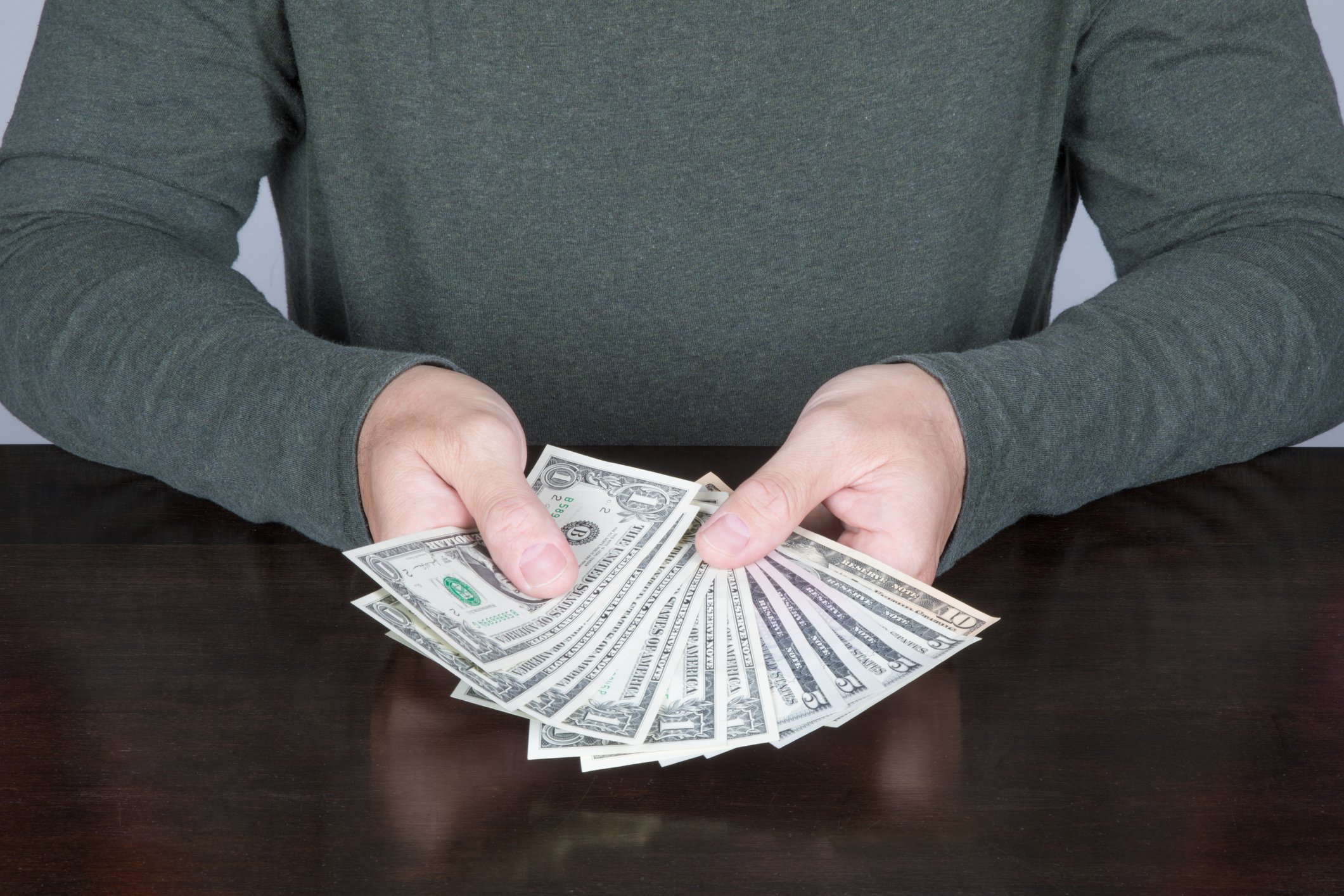 Person counting money