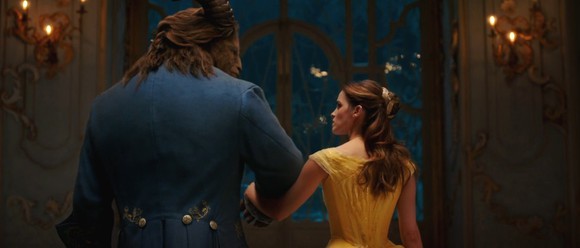 Scene from "Beauty and the Beast" -- two title characters walking arm-in-arm, as shown from behind.