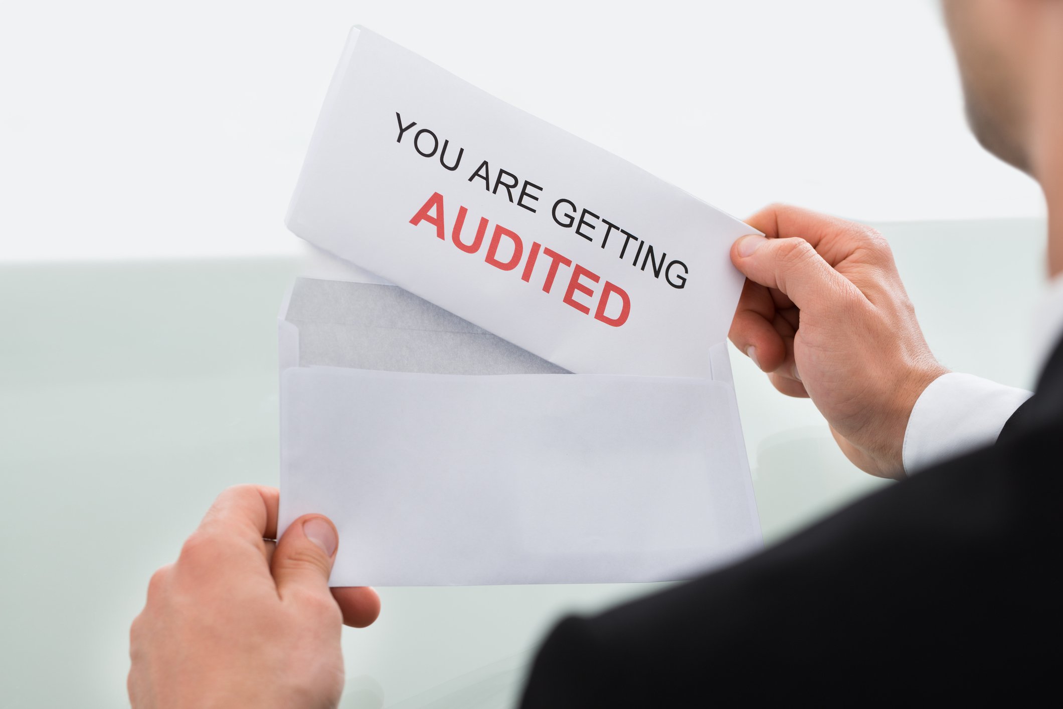 Letter reading "You are getting AUDITED"