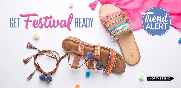 Some shoes scattered across a floor