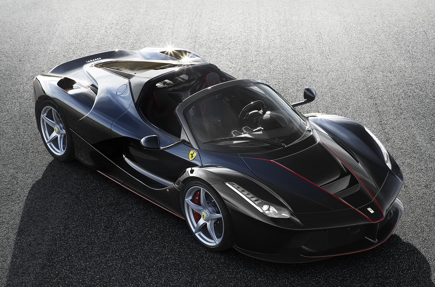 A black LaFerrari Aperta sports car. 