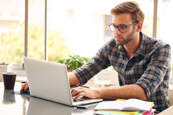 Student working on a laptop