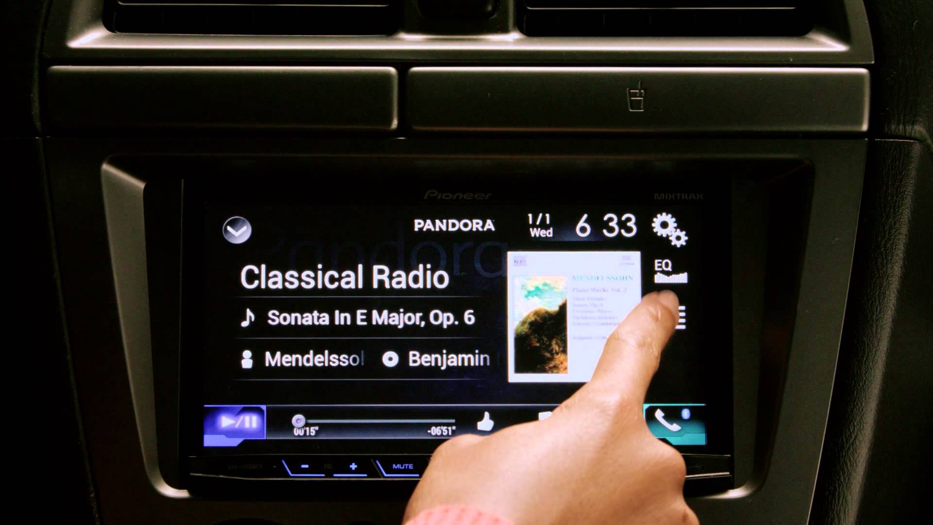 The Pandora app on a car dashboard.
