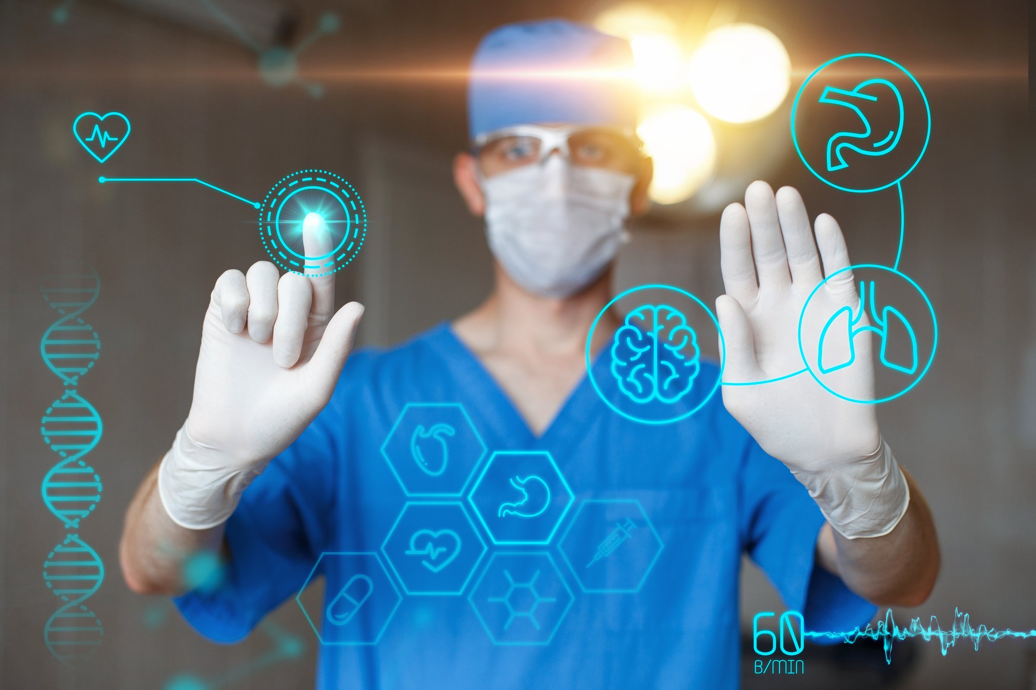 Surgeon touching screen with medical icons