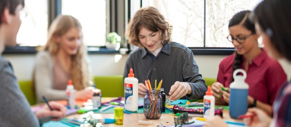 A group of students making art