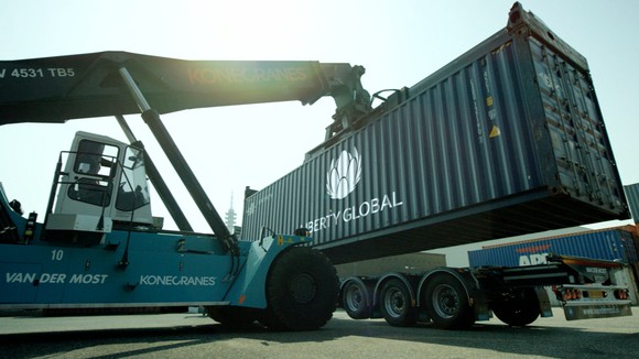 Shipping container with Liberty Global name.