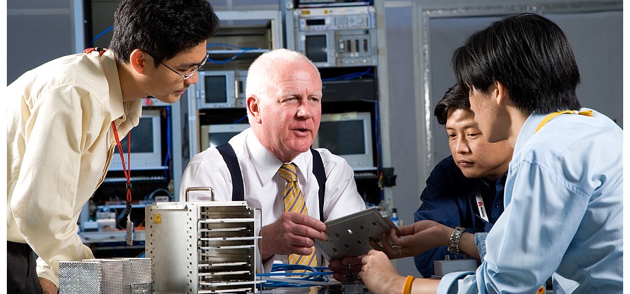 Fabrinet employees in discussion..