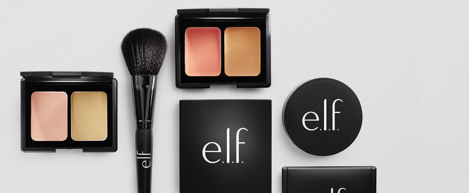 A display of beauty products with the elf logo on them. 