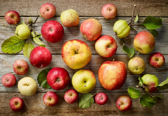 Apples on a wooden-slat table